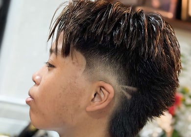 Modern hairstyle with fade and texture at Offcut Club, Singapore, Singapore, SG.