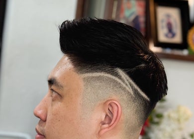 Stylish men's haircut with sleek design at Offcut Club, Singapore, Singapore, SG.
