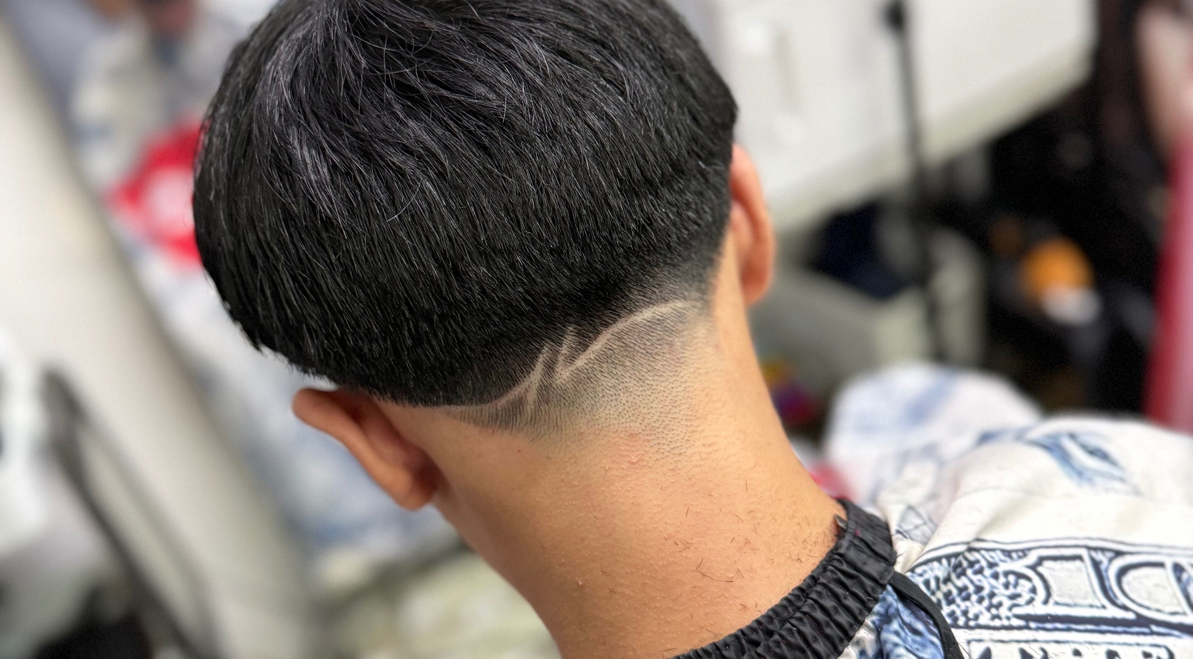 Close-up of a trendy undercut hairstyle at Offcut Club, Singapore, Singapore, SG, showcasing modern grooming.