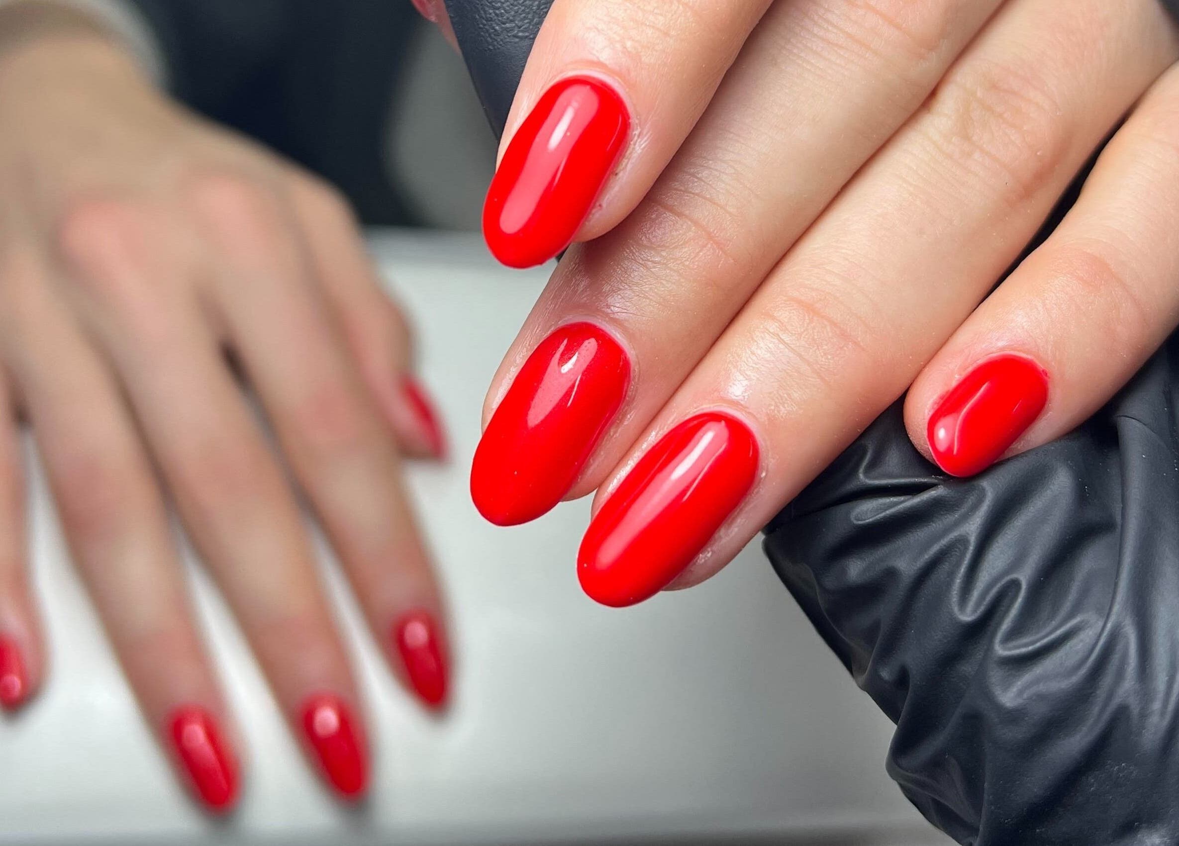 Beautiful red manicured nails at Megs Manicures, Abbots Leigh, England, GB.