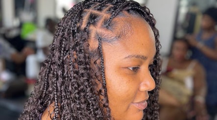 Elegant braided hairstyle at Styled By Mo 🌸 in Montego Bay, St. James Parish, JM.