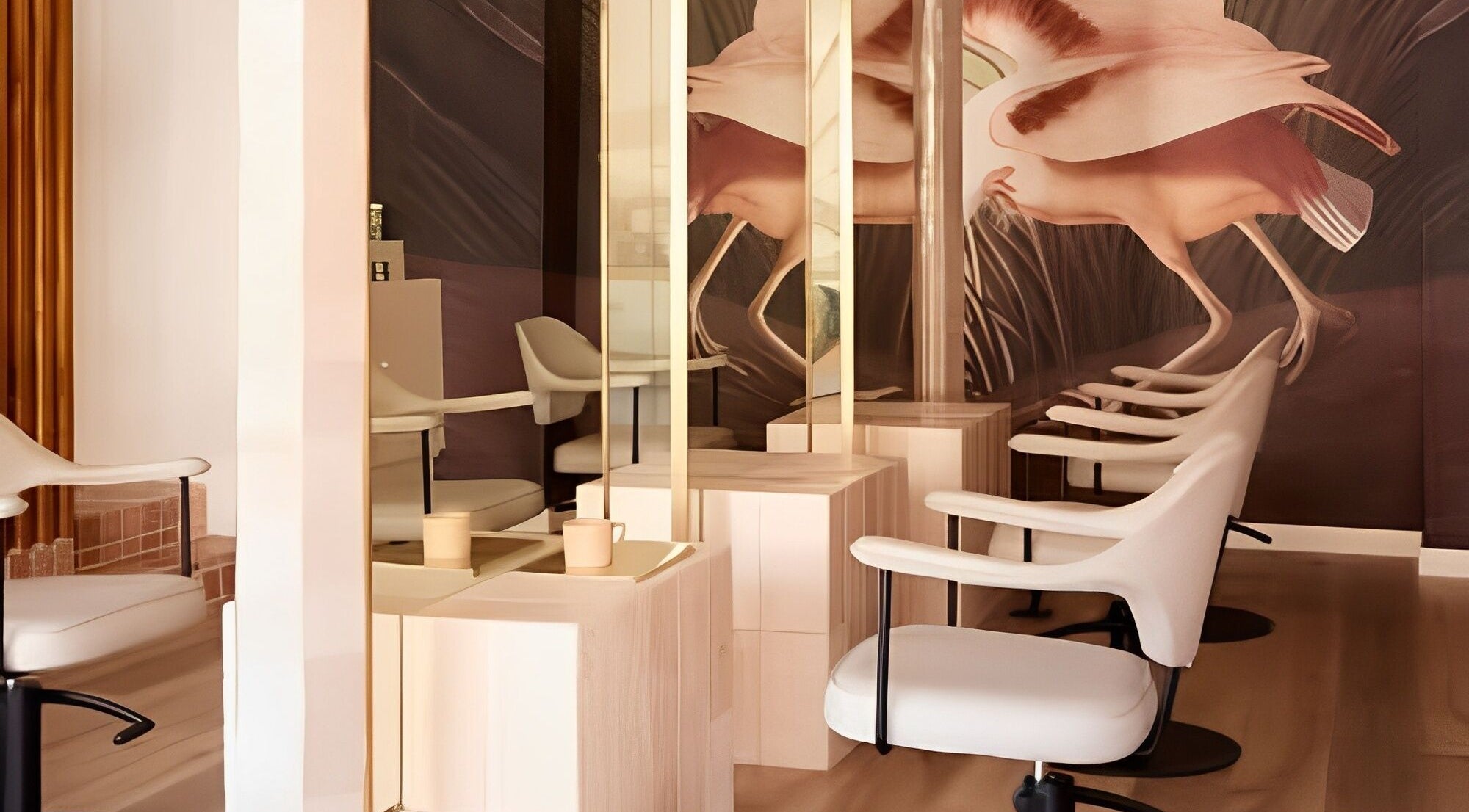 Elegant salon interior at Vincent & Dupree, Waverley, New South Wales, AU with sleek chairs and artistic decor.