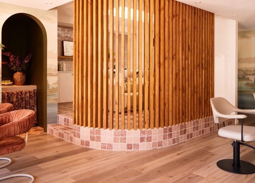 Modern beauty lounge at Vincent & Dupree, Waverley, New South Wales, AU featuring chic seating and warm decor.