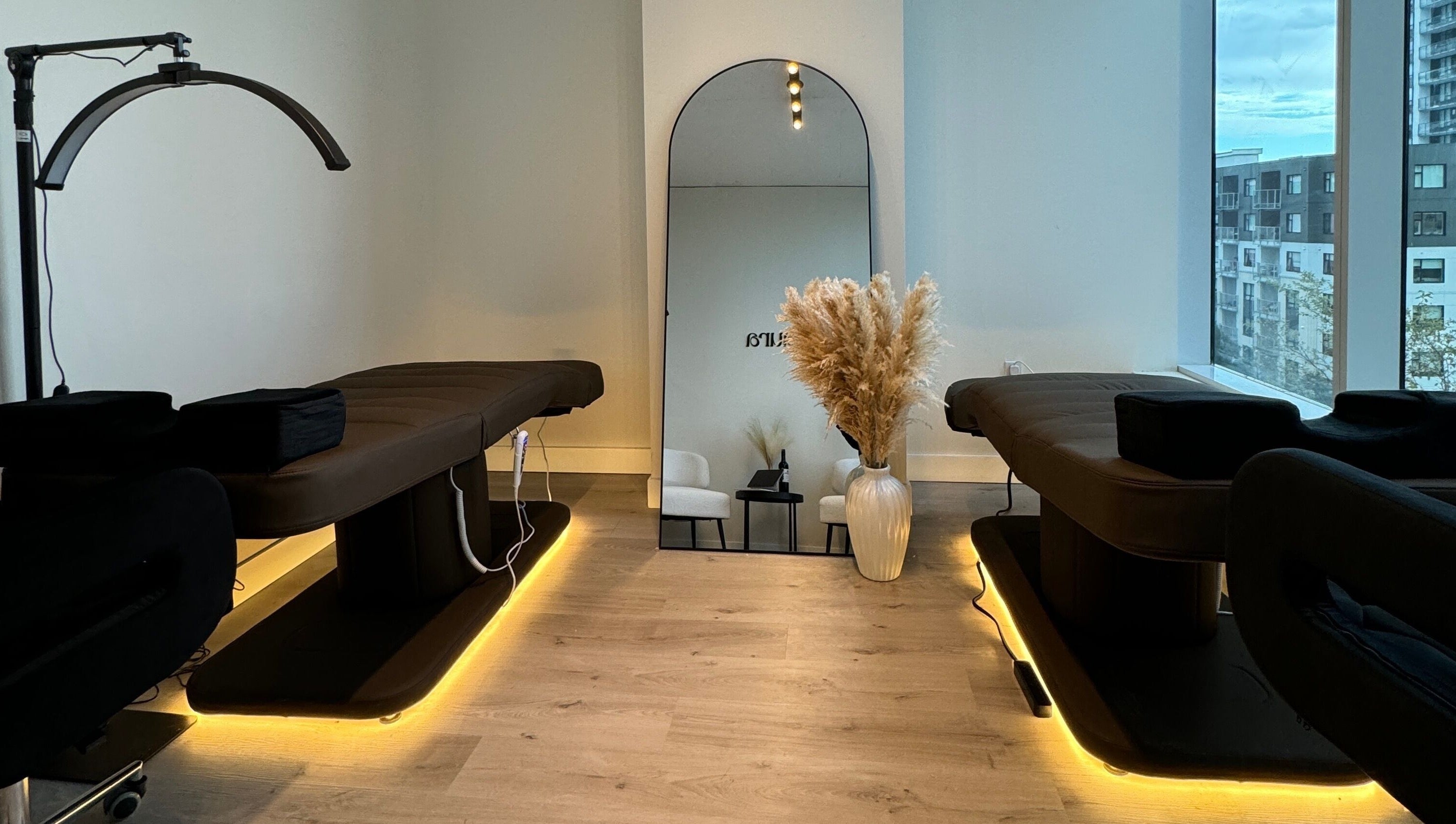 Modern treatment room at Lushaura Lash Studio, Burnaby, British Columbia, CA with elegant decor and natural lighting.