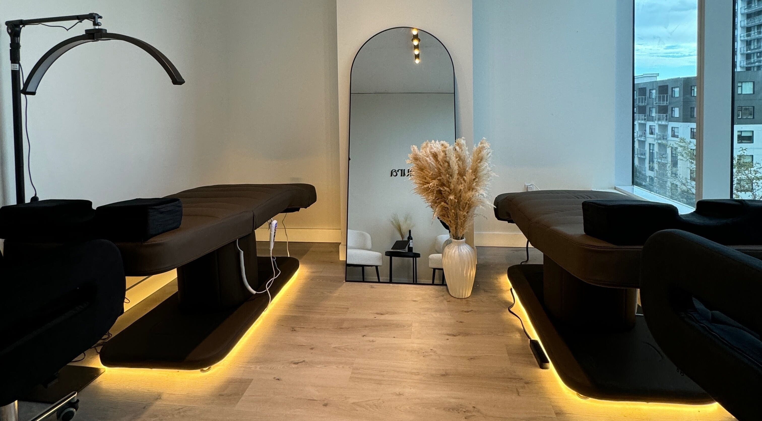 Modern treatment room at Lushaura Lash Studio, Burnaby, British Columbia, CA with elegant decor and natural lighting.