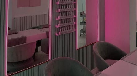 Elegant neon-lit beauty studio at KS Beauty By Kai, Sale, England, GB, showcasing chic decor and modern seating.