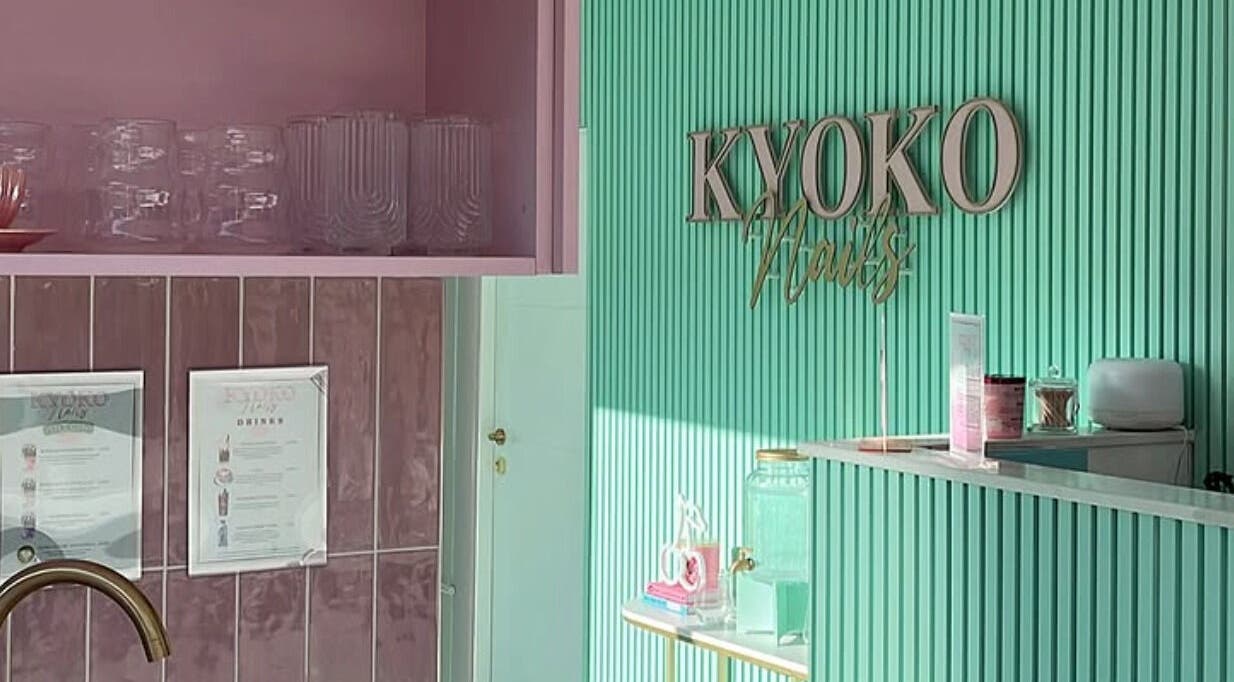 Stylish interior of KS Beauty By Kai in Sale, England, GB with pink and green decor.