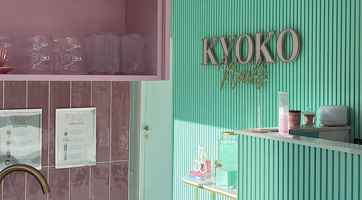 Stylish interior of KS Beauty By Kai in Sale, England, GB with pink and green decor.