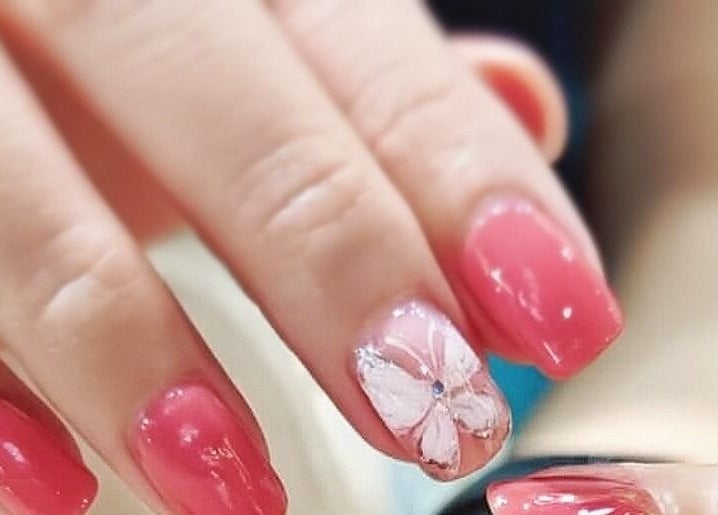 Elegant pink and floral nail art at Home Nails, Singapore, Singapore, SG. Perfect for stylish manicures.