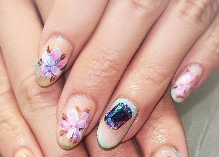 Close-up of floral and gem nail art at Home Nails, Singapore, Singapore, SG.