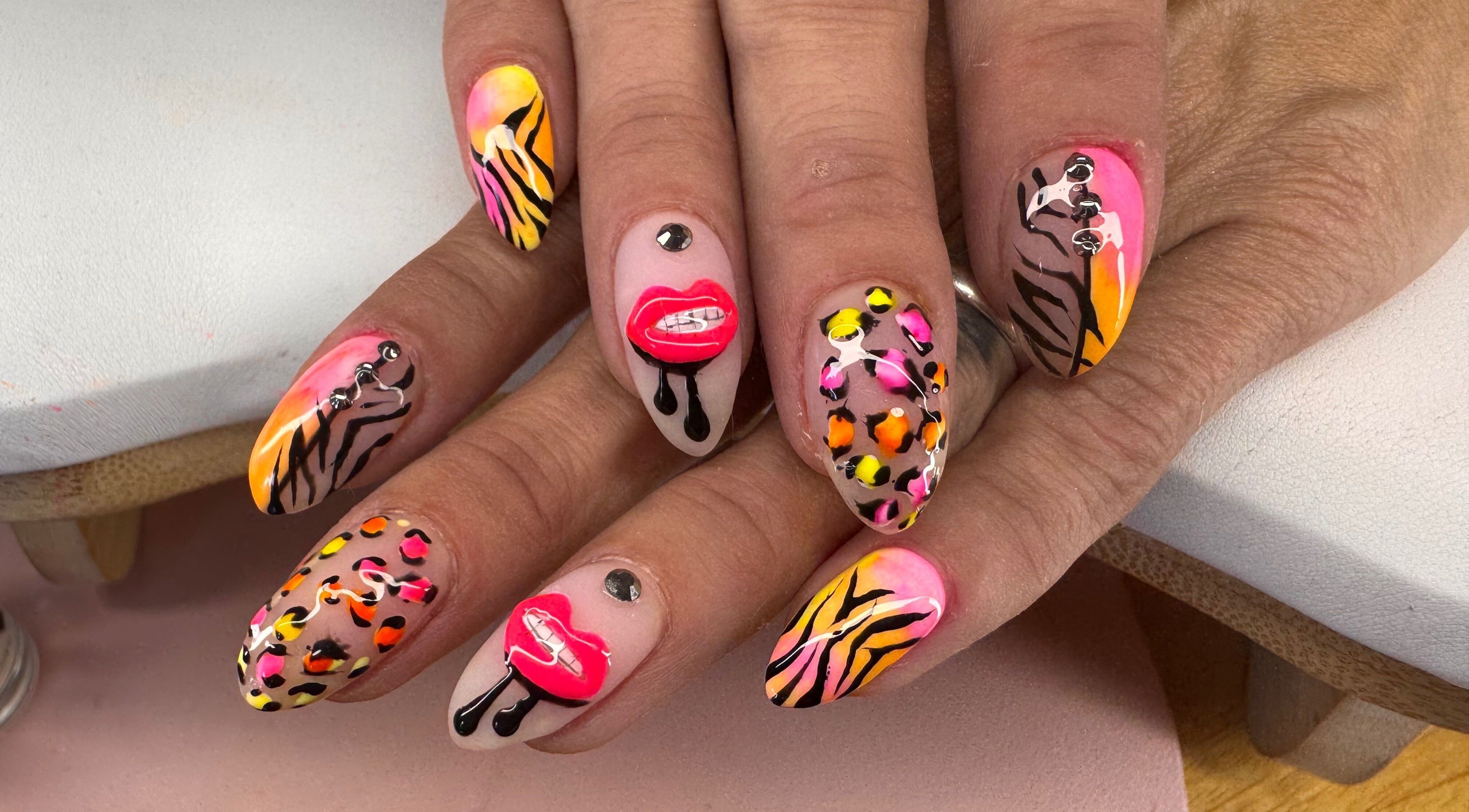 Bold nail art at Diamond Nails by Mariela, Sindlesham, England. Mobile service available for creative designs.