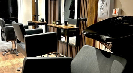 Modern salon chairs and wash station at Hair By Jess in Penlle'r-gaer, Cymru, GB.