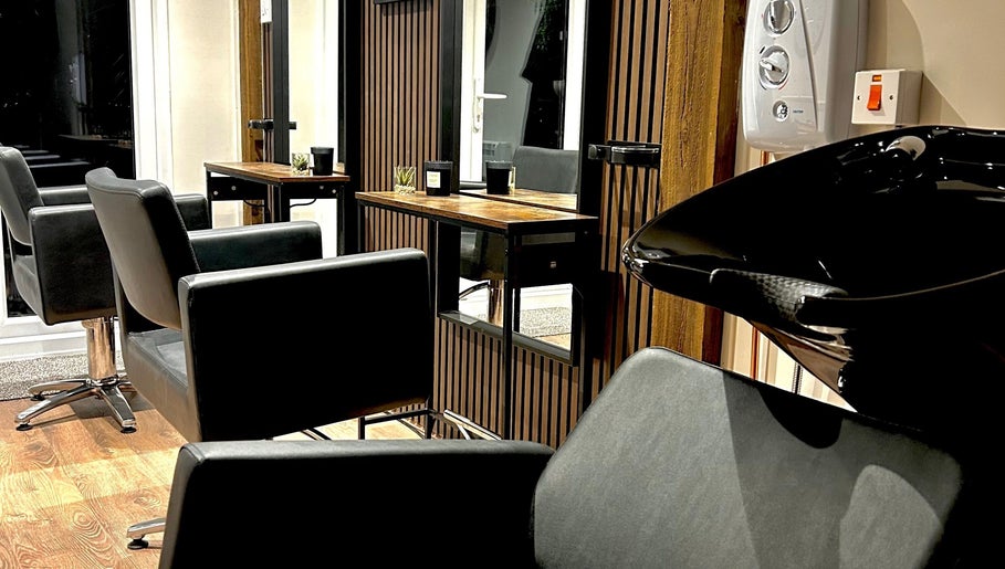 Elegant styling chairs at Hair By Jess, Penllergaer, Cymru, GB, offering a chic and welcoming atmosphere.