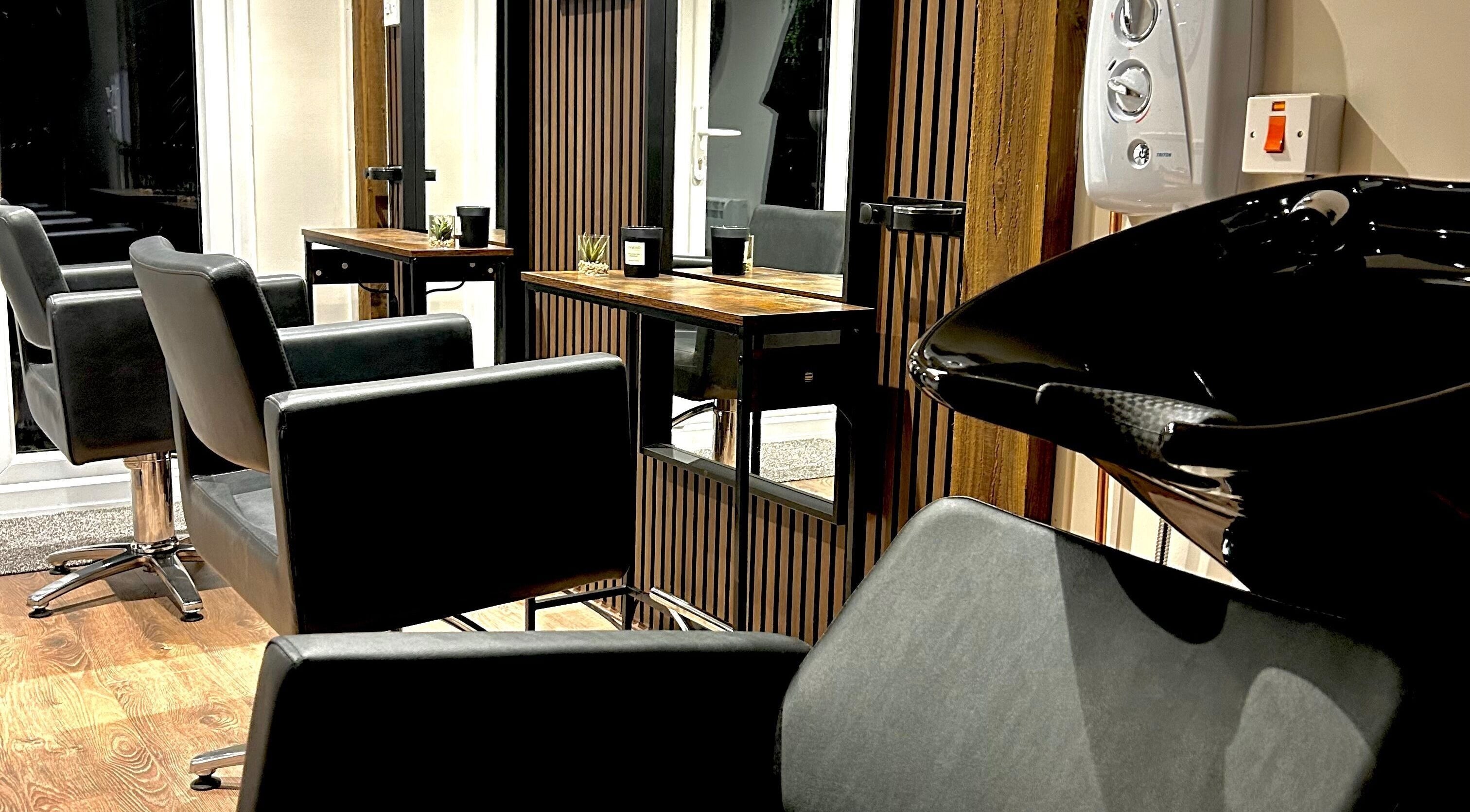 Elegant styling chairs at Hair By Jess, Penllergaer, Cymru, GB, offering a chic and welcoming atmosphere.