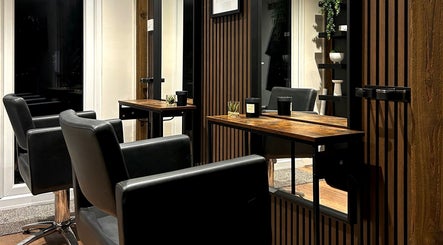 Stylish salon chairs and mirrors at Hair By Jess, located in Penllergaer, Cymru, GB.