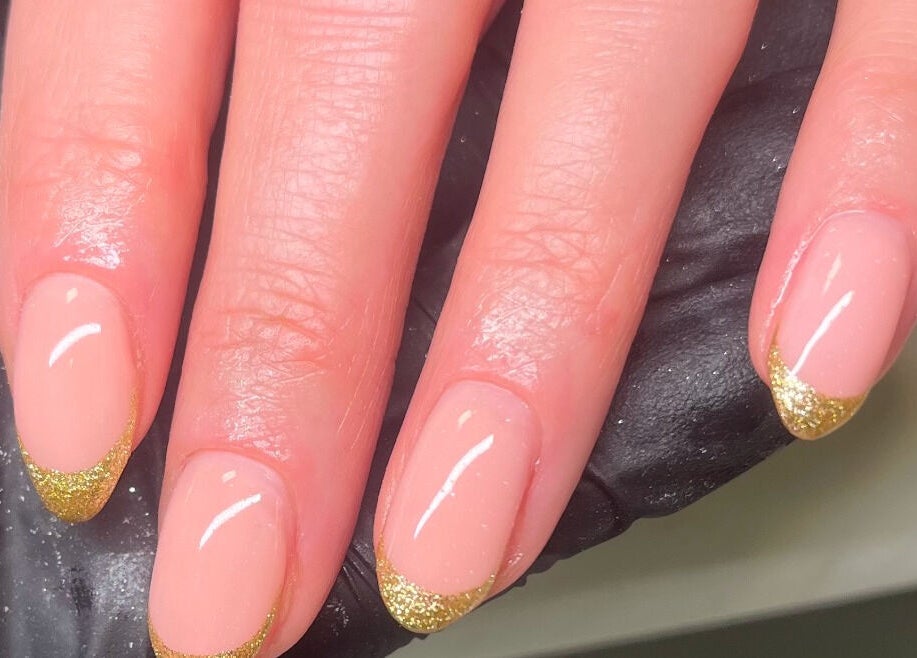 Elegant gold-accented manicure at ByAbi, Dinnington, England, GB, showcasing nail art expertise.