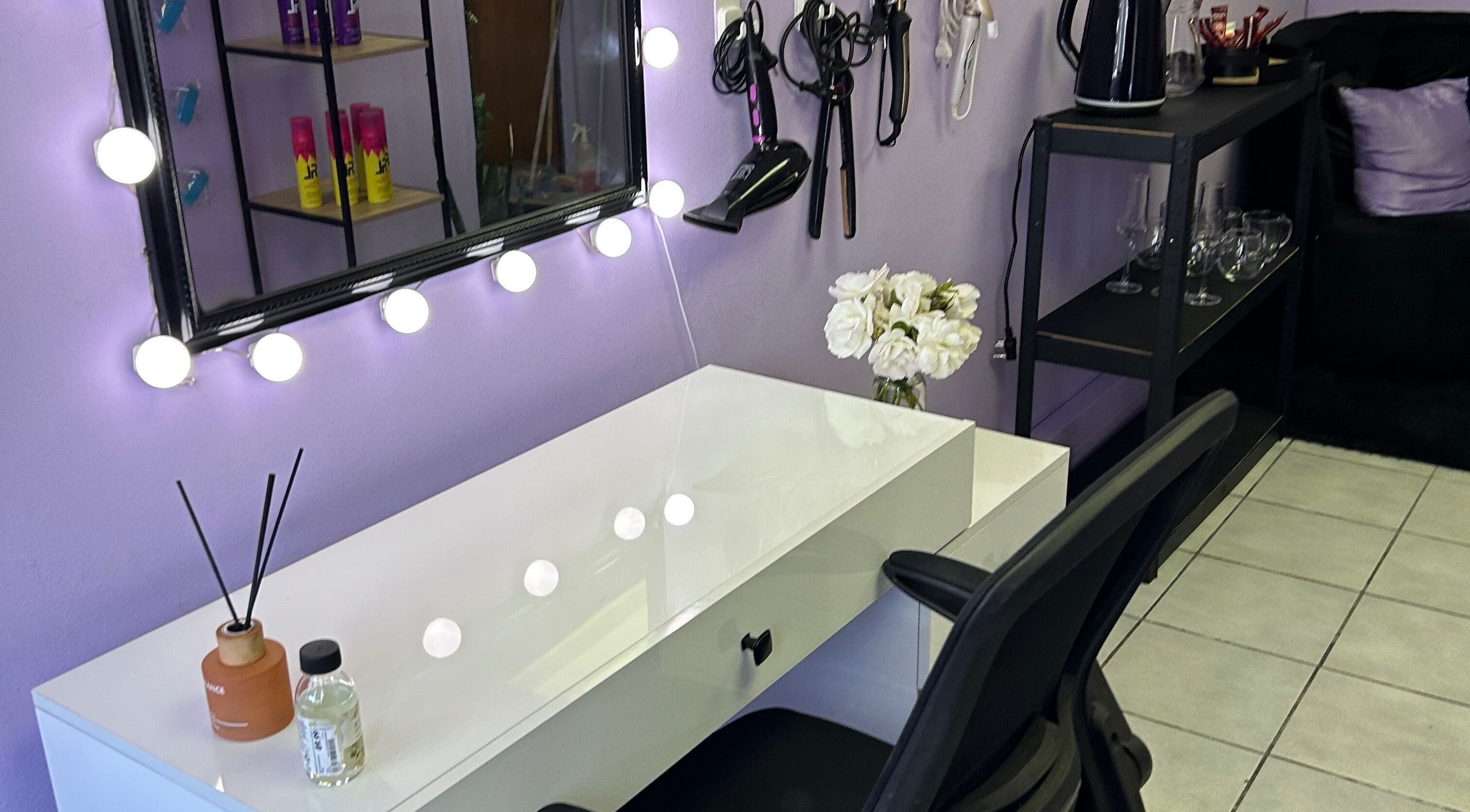 Vanity setup at Face Card Aesthetics, Pretoria, Gauteng, ZA with illuminated mirror and hair tools.