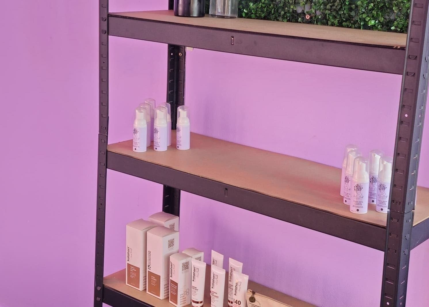 Colorful shelf with skincare products at Face Card Aesthetics, Pretoria, Gauteng, ZA.