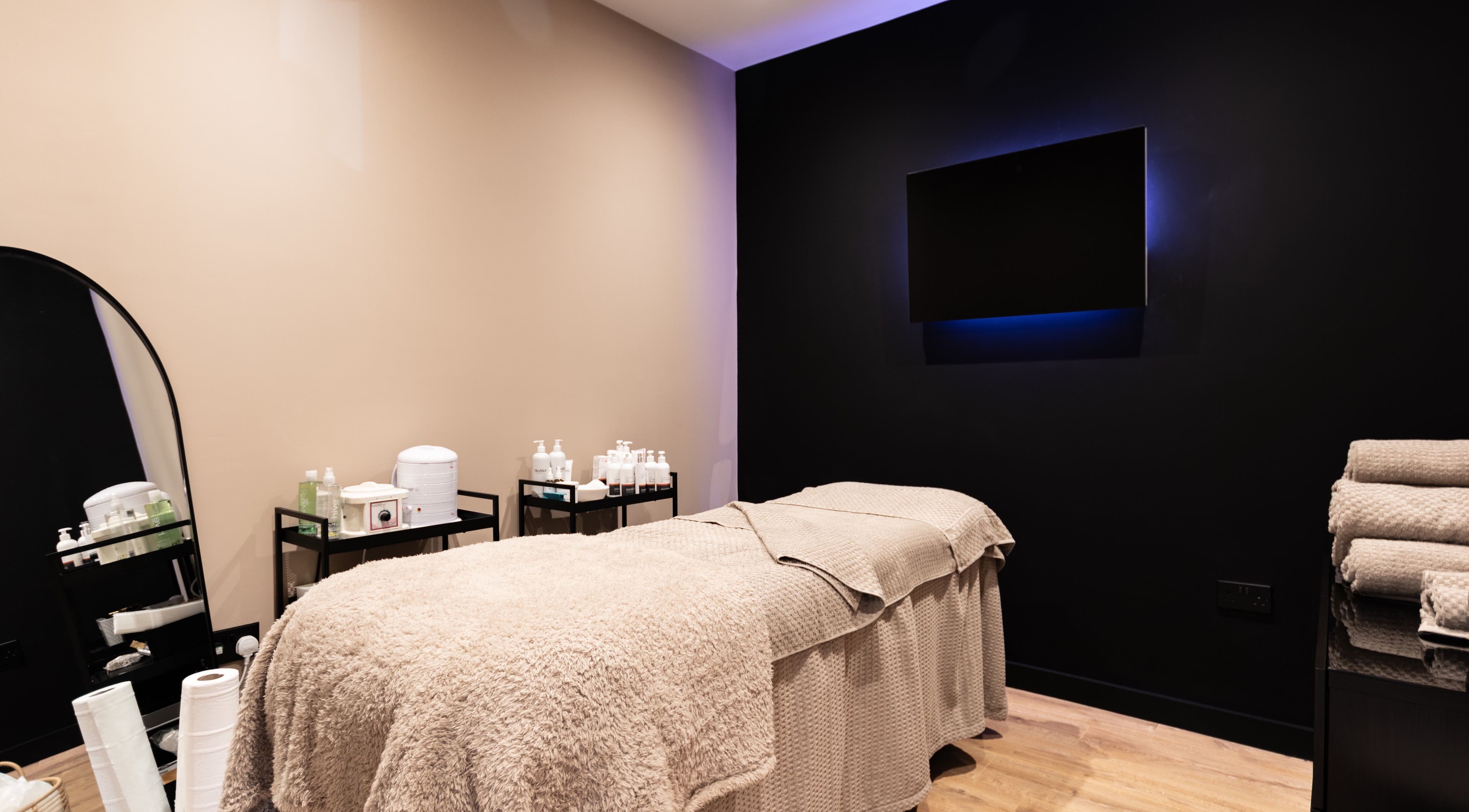 Luxurious spa room at Katie and Julia @ The Beauty Lab in York, England, GB. Elegant decor and plush bedding.