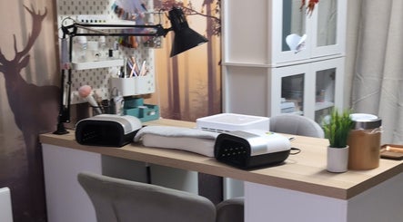 Nail salon décor at Nails Élégance, Magné, Nouvelle-aquitaine, FR, showcasing a chic workspace.