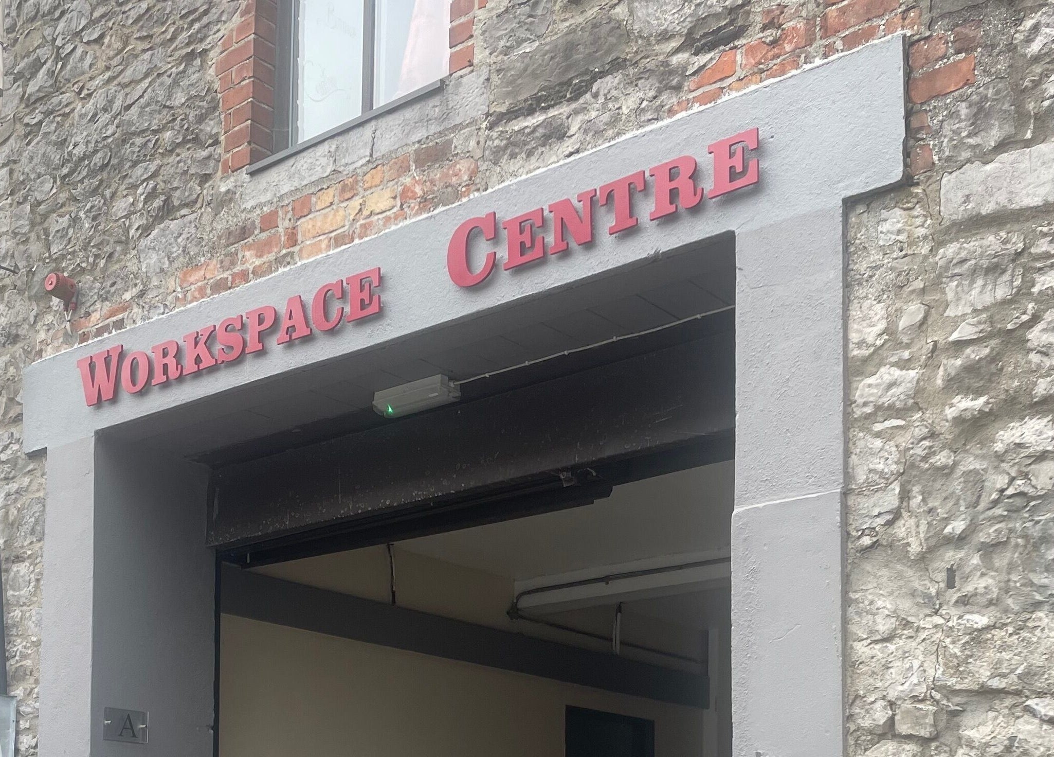 Entrance to Workspace Centre near Nanolash by Hannah 🎀, Drogheda, County Louth, IE, showcasing rustic stone walls.