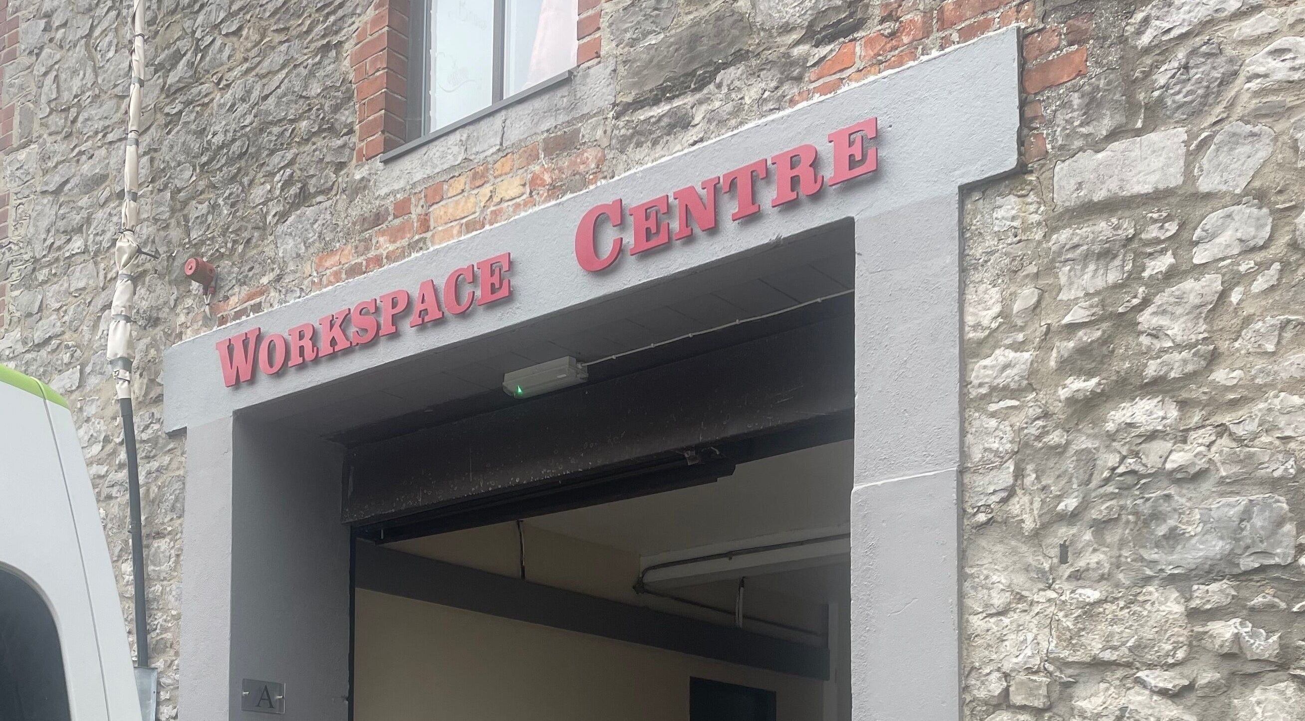Entrance to Workspace Centre near Nanolash by Hannah 🎀, Drogheda, County Louth, IE, showcasing rustic stone walls.