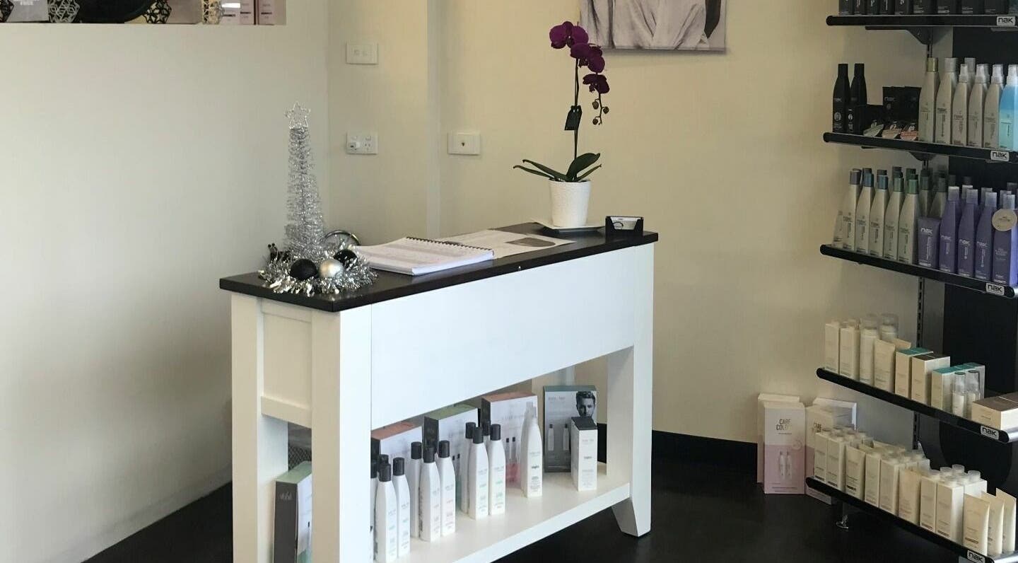 Reception area at Teazed in Scottsdale, Tasmania, AU, featuring products and decorations on a sleek desk.