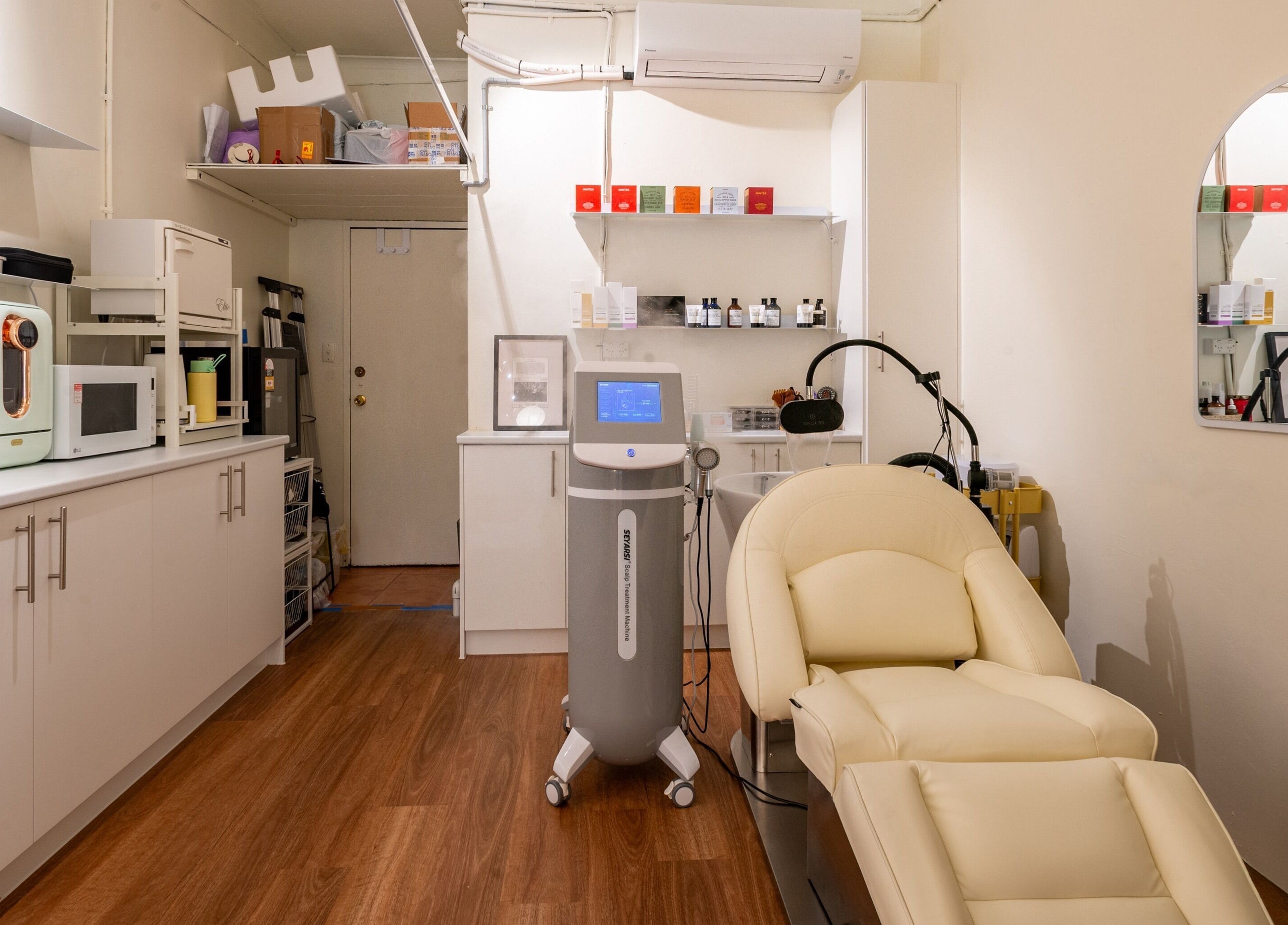Modern treatment room at Vaness Salon, Caringbah, New South Wales, AU. Features reclining chair and beauty equipment.
