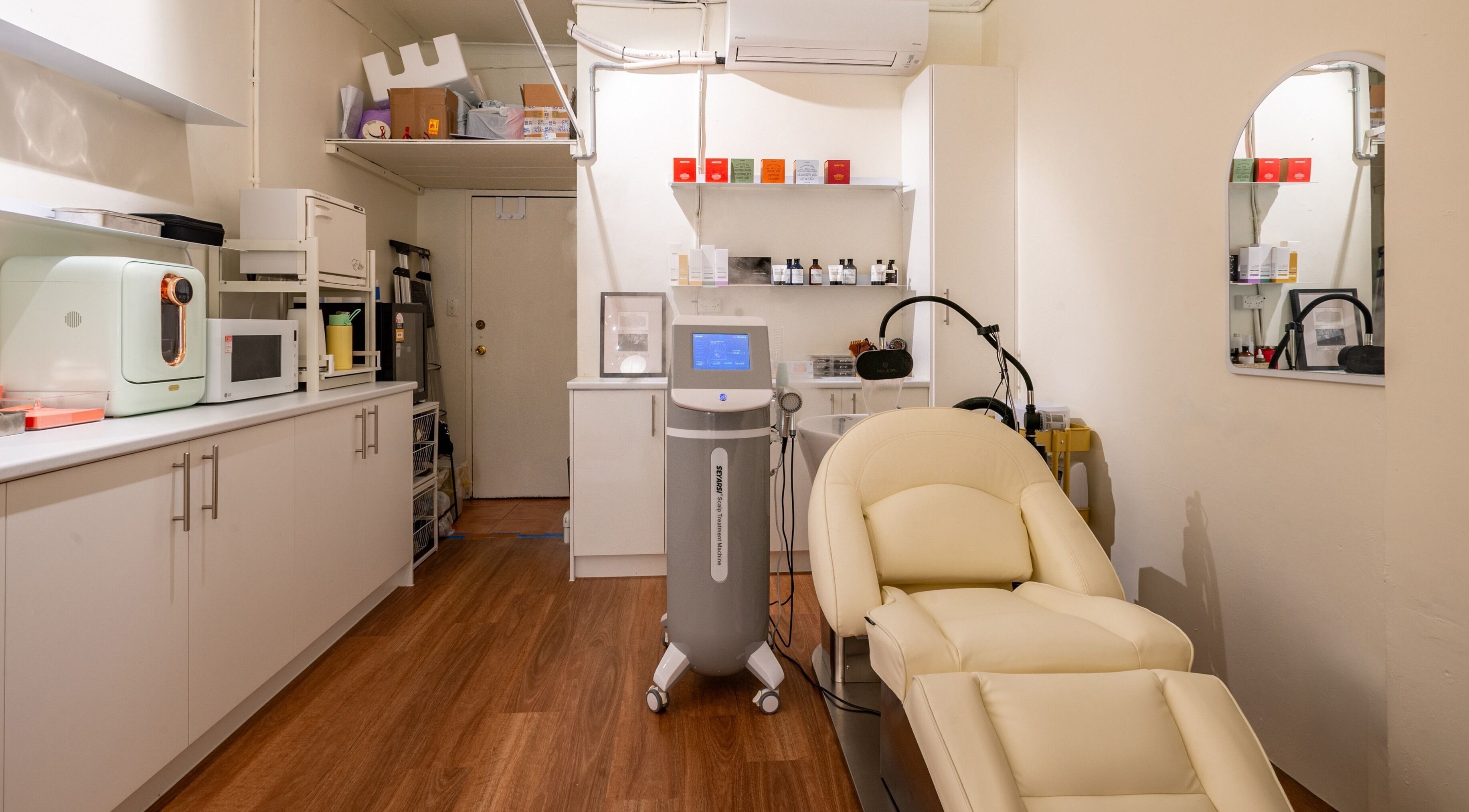 Modern treatment room at Vaness Salon, Caringbah, New South Wales, AU. Features reclining chair and beauty equipment.