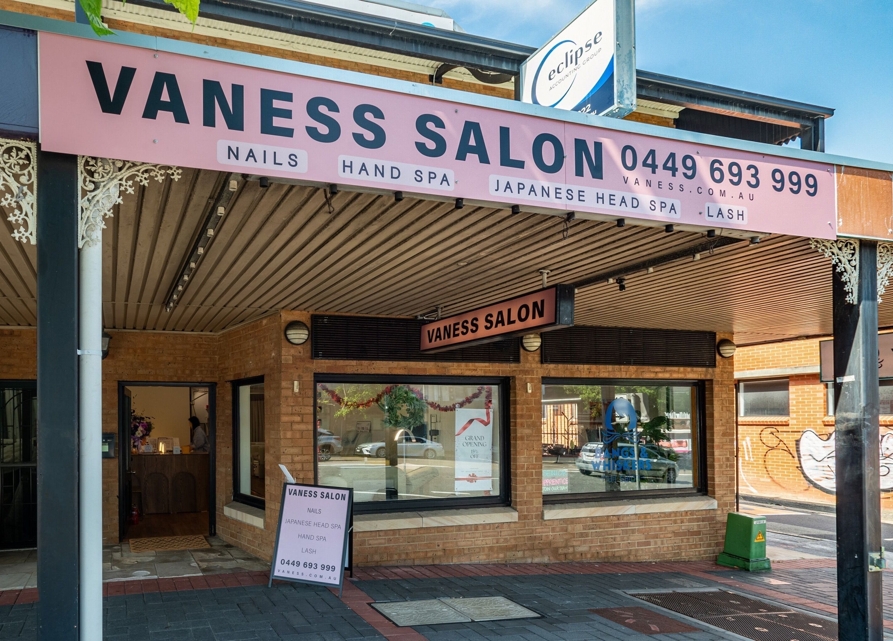 Front entrance of Vaness Salon in Caringbah, New South Wales, AU, showcasing inviting exterior design.
