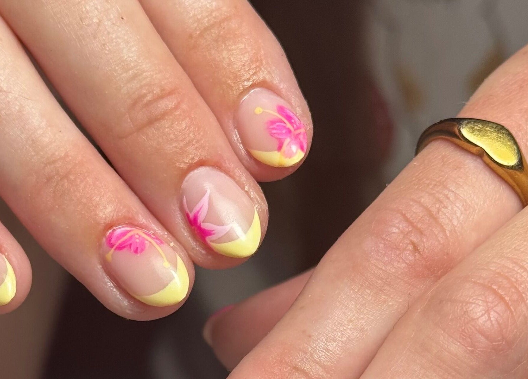Elegant floral nail art at B's Nail Lounge, Cartwirght, New South Wales, AU, showcasing pink and yellow designs.