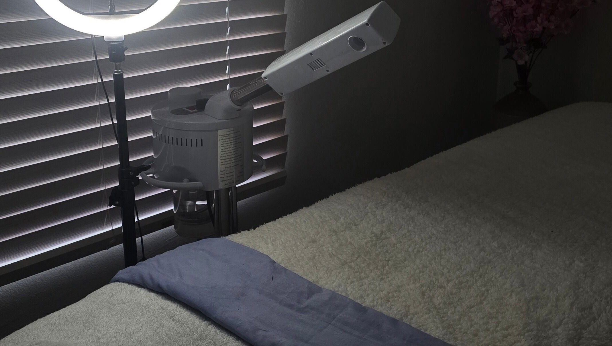 Cozy treatment room at Whispering Waters, Bloemfontein, Free State, ZA with massage bed and professional lighting.