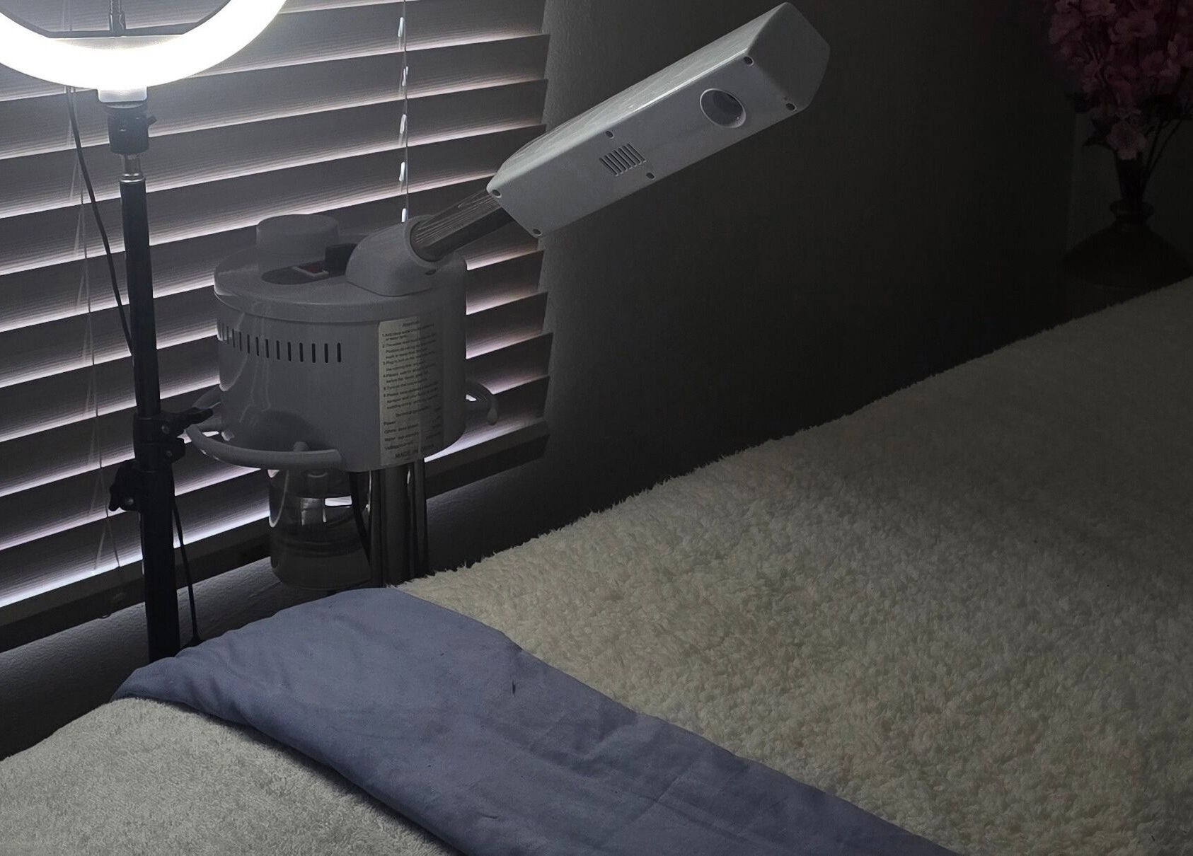 Cozy treatment room at Whispering Waters, Bloemfontein, Free State, ZA with massage bed and professional lighting.