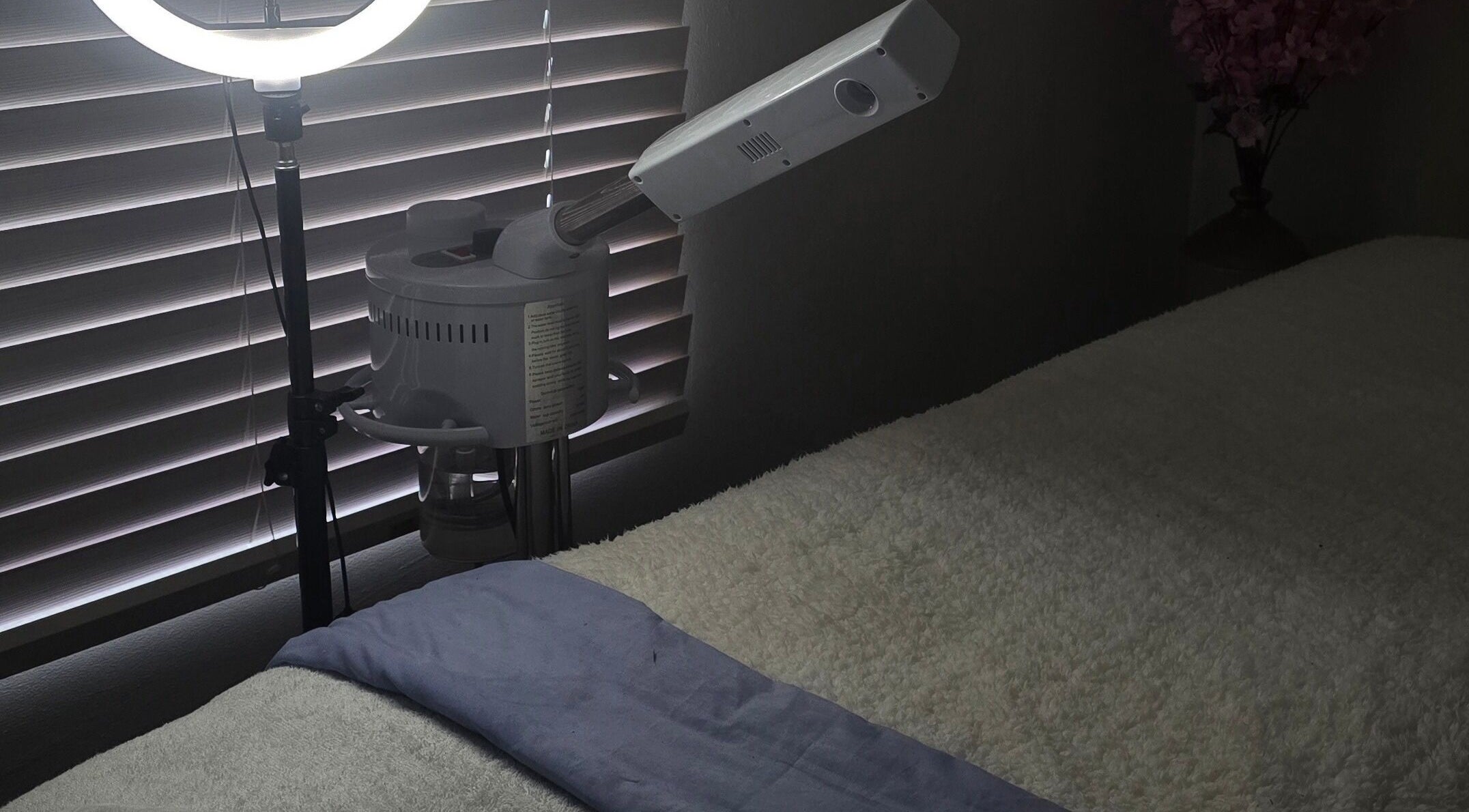 Cozy treatment room at Whispering Waters, Bloemfontein, Free State, ZA with massage bed and professional lighting.