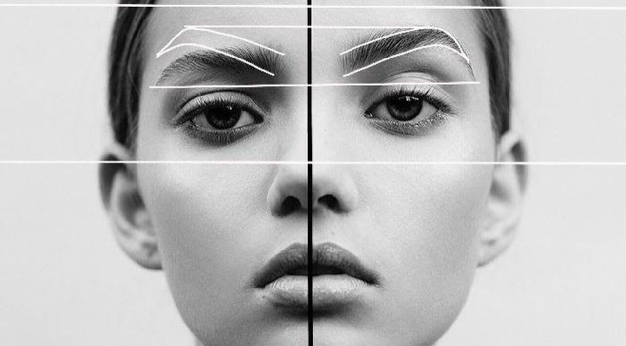 A symmetrical face alignment graphic at Etch of Beauty, Moorebank, New South Wales, AU.