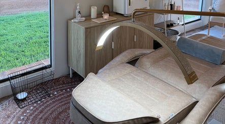 Luxurious treatment bed at Tiarne Lauren Beauty, Vasse, Western Australia, AU, inviting for relaxation.