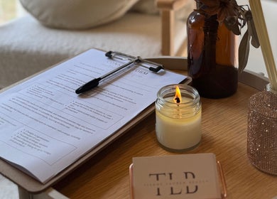 Relaxing setup at Tiarne Lauren Beauty, Vasse, Western Australia, showing form, candle, and decor.