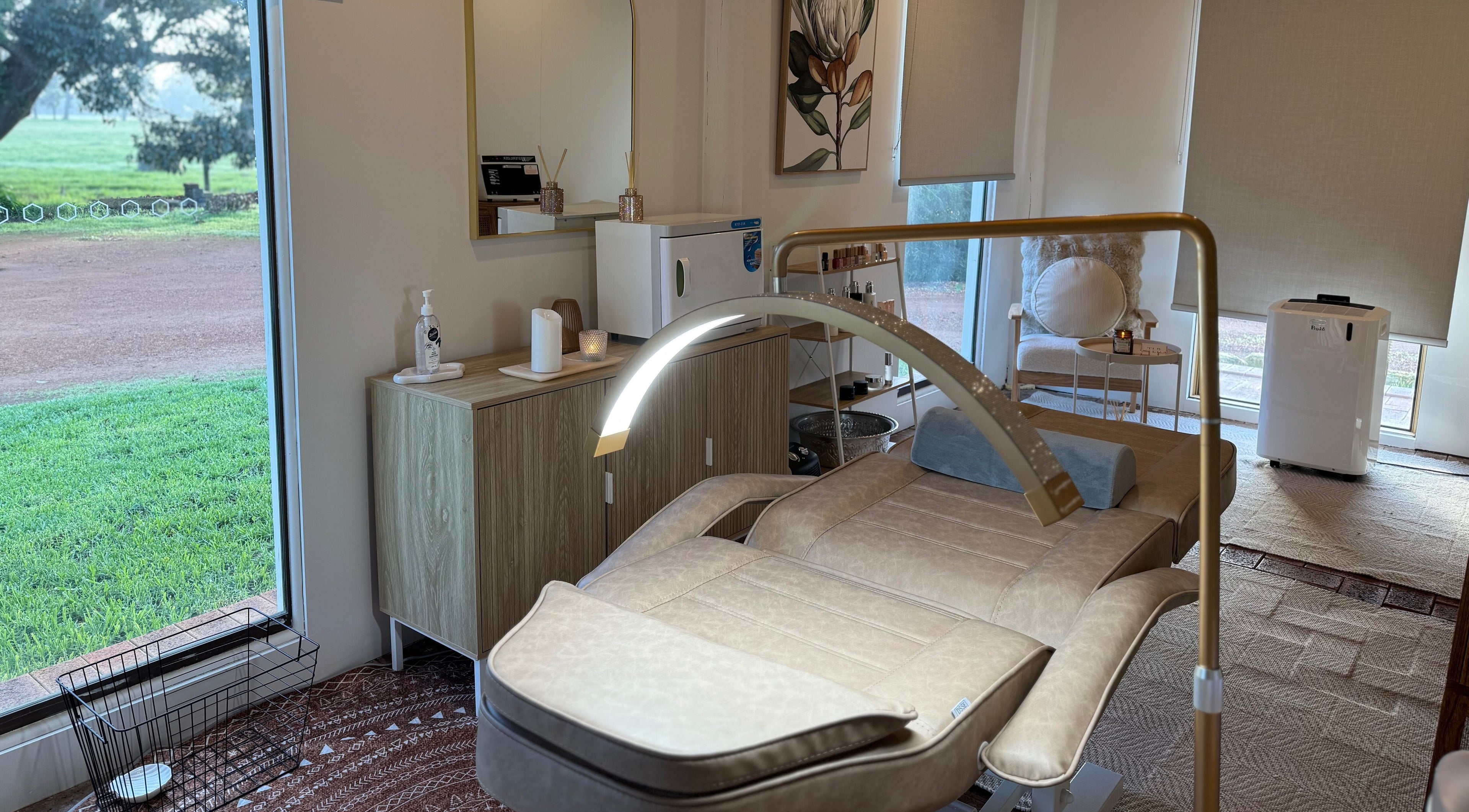 Elegant treatment room at Tiarne Lauren Beauty, Vasse, Western Australia, AU, featuring a comfortable beige bed.