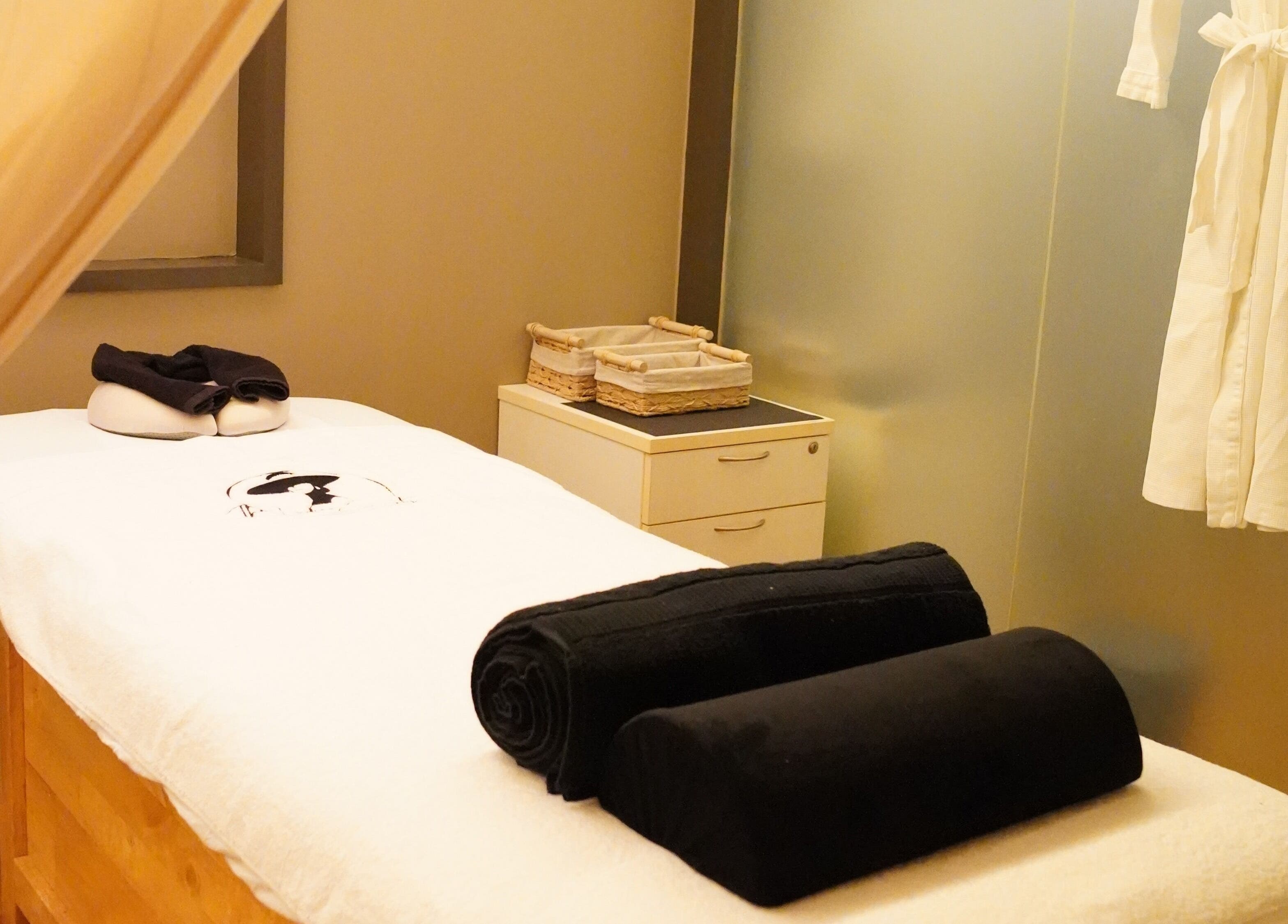 Relaxing massage room at The Ladies Society SPA in Ampang, Selangor, MY offering tranquility and comfort.