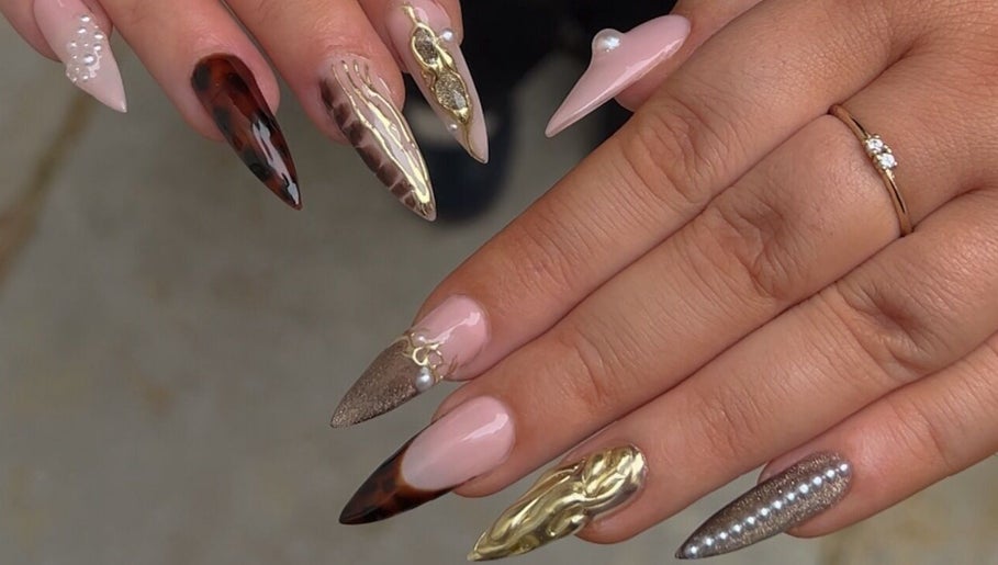 Stylish nail designs at Sunday Nail Club in Colchester, England, GB showcasing unique patterns and textures.