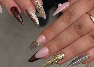 Stylish nail designs at Sunday Nail Club in Colchester, England, GB showcasing unique patterns and textures.