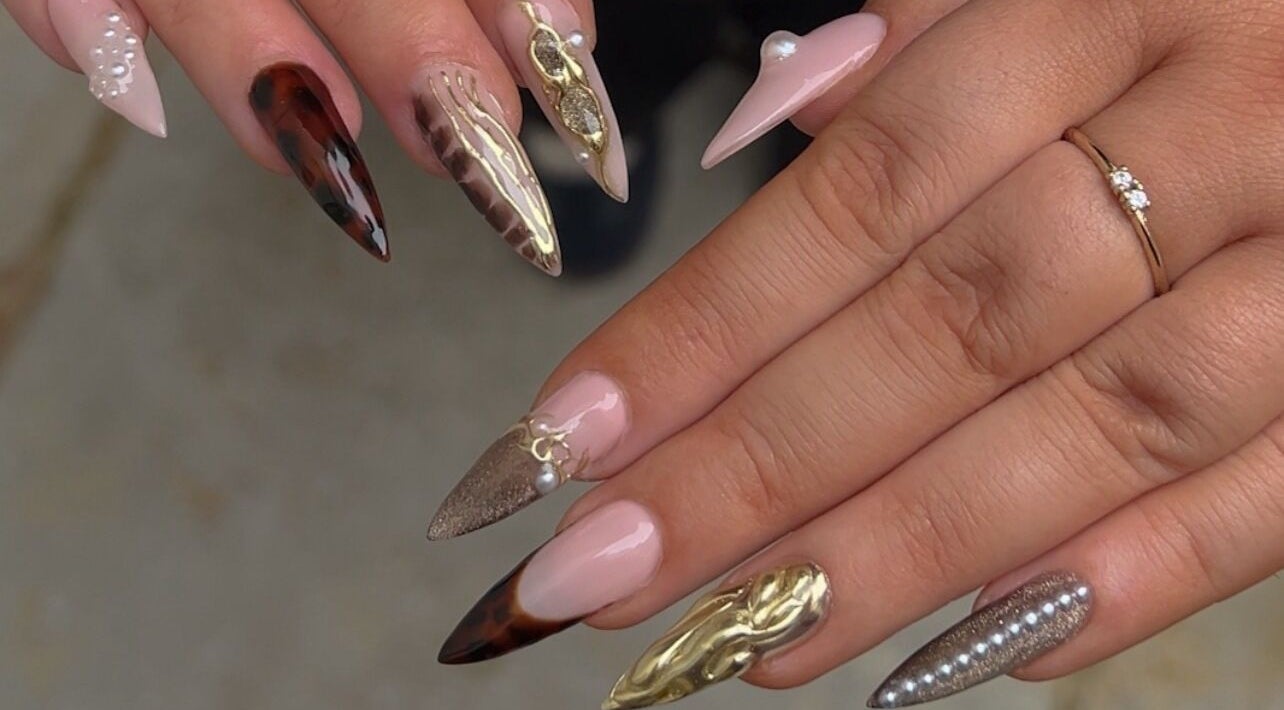 Stylish nail designs at Sunday Nail Club in Colchester, England, GB showcasing unique patterns and textures.