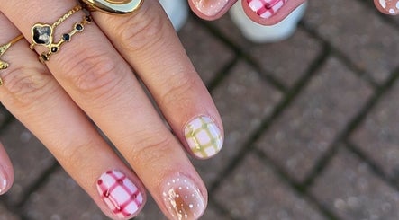 Detailed plaid nail art design at Sunday Nail Club in Colchester, England, GB offering unique styles.