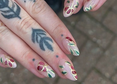 Floral nail art designs showcased at Sunday Nail Club, Colchester, England, GB, highlighting intricate patterns.