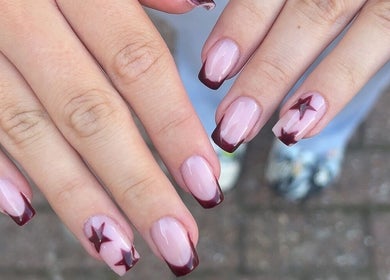 Elegant star-themed French manicure at Sunday Nail Club, Colchester, England, GB.