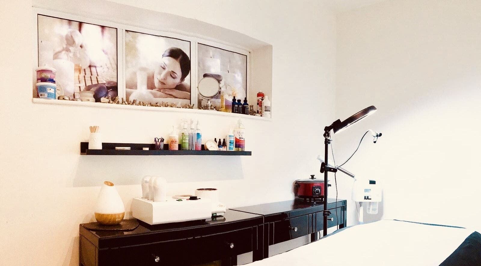 Beauty Highcliffe treatment room in Highcliffe, England, GB with spa decor and beauty equipment.