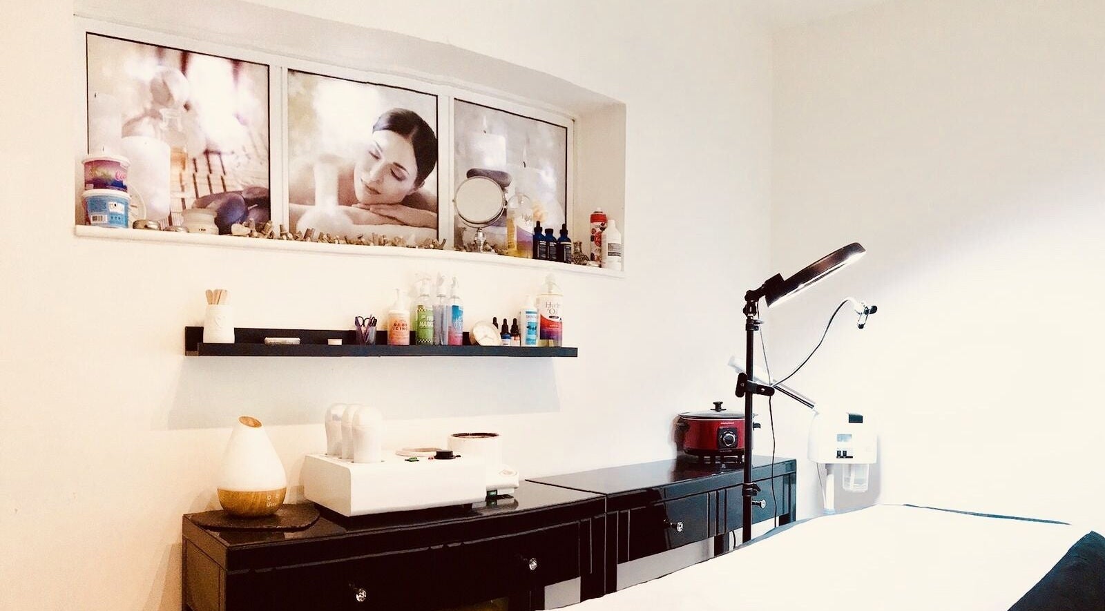Beauty Highcliffe treatment room in Highcliffe, England, GB with spa decor and beauty equipment.