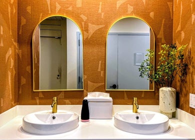 Luxurious restroom with modern mirrors at Laser 'n' Beyond - Chelsea NYC, New York, New York, US.