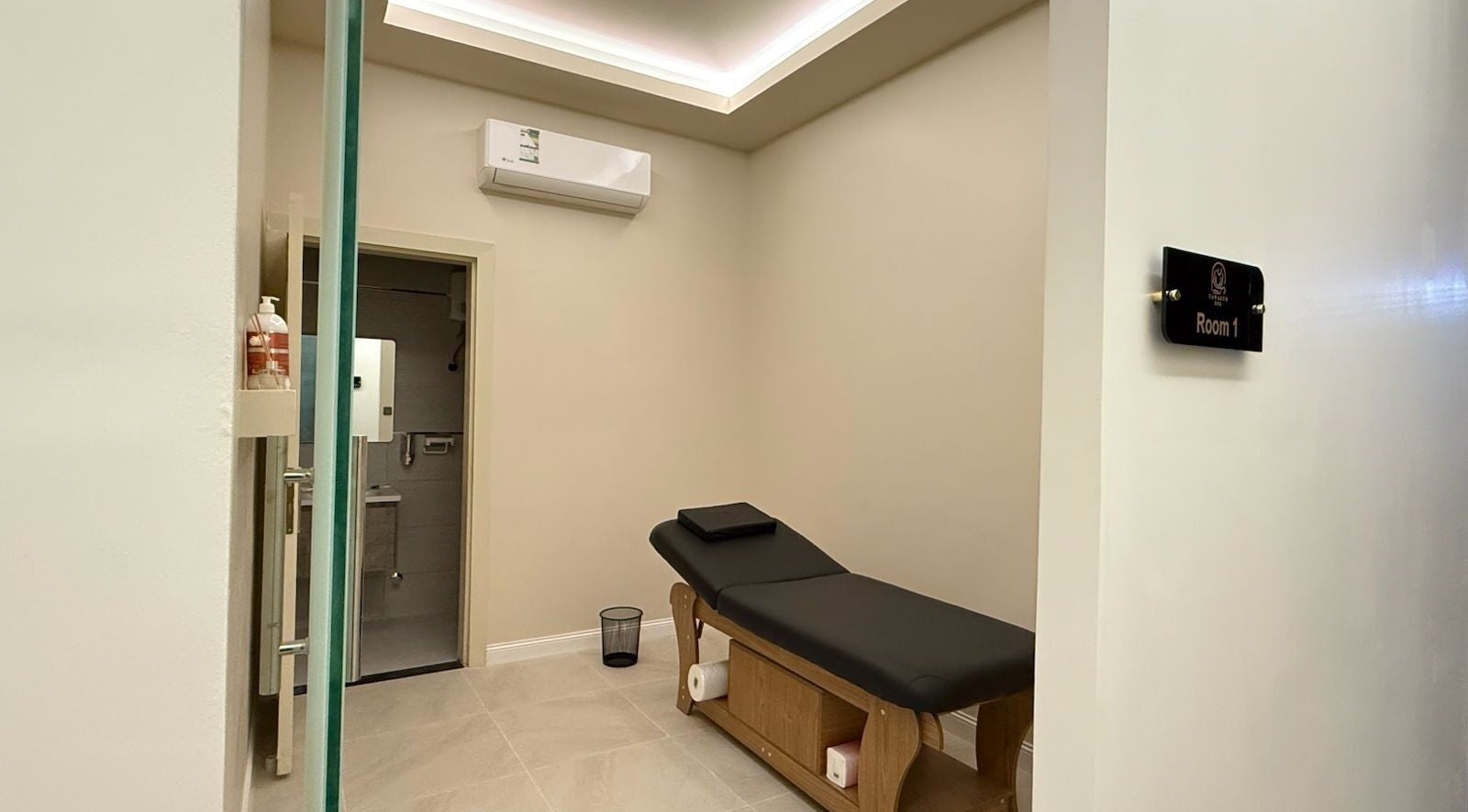 A tranquil treatment room at Tawazun Spa, Riyadh, Riyadh Province, SA, featuring a comfortable massage table.