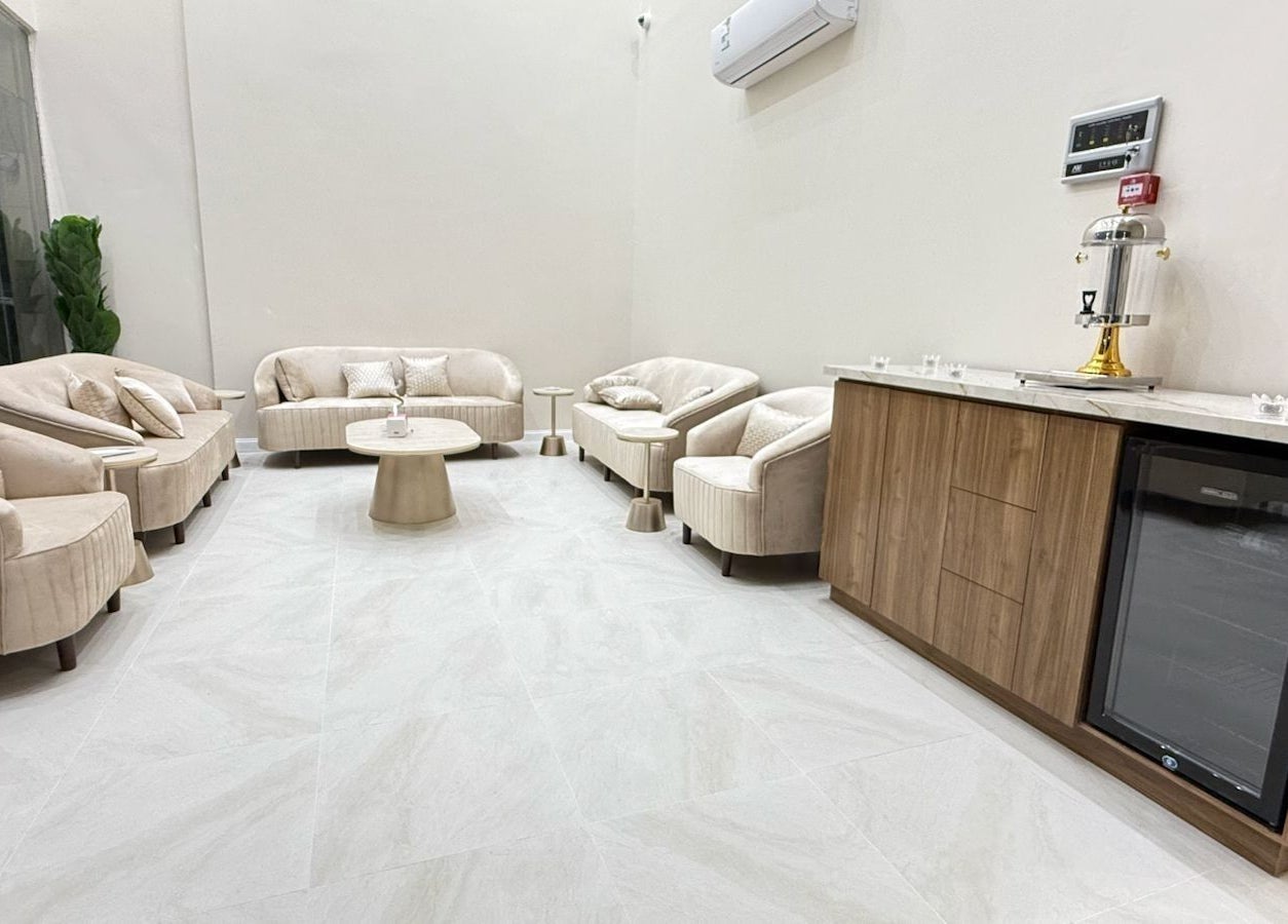 Cozy seating area at Tawazun Spa, Riyadh, Riyadh Province, SA, featuring plush sofas and modern decor.